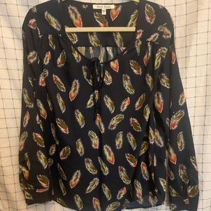 Blouse with feathers